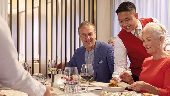 People dining in the Amalfi restaurant on Spirit of Adventure